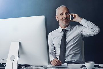 Image showing Technology, mature businessman on a phone call and against a studio background at his desk taking notes. Online communication, social networking with client and male person on smartphone talking