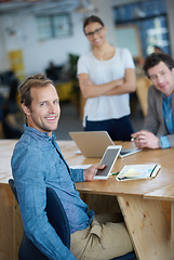 Image showing Teamwork, portrait or happy programmers in meeting for discussion or brainstorming together in office. Diversity, digital or web developers networking with technology, tablet or laptop in workplace