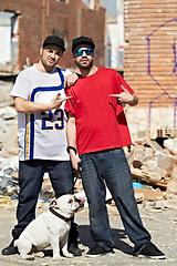 Image showing Portrait, gang and dog with man friends and their pet outdoor in a dangerous neighborhood together. Street, crime and culture with male gangsters and their bulldog puppy on an urban background