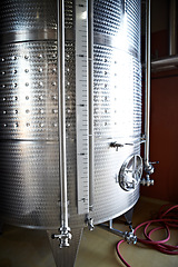 Image showing Beer tank, machine and manufacturing plant for alcohol with steel container for liquor. Metal, wine fermentation and drum in a factory company with brewery equipment and drink at a distillery