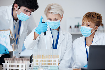 Image showing Analysis, covid team and employees in a lab for healthcare research, medical analytics or science. Chemistry, education and scientists witth face mask and teamwork to study a liquid or chemical