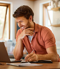 Image showing Notes, laptop and remote work, happy man at kitchen counter reading email, social media meme or networking for online job. Technology, communication and freelancer on internet writing blog or article