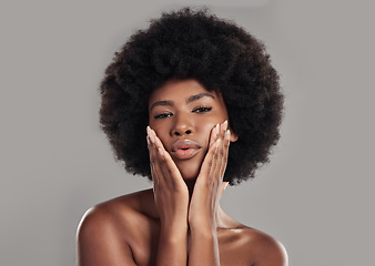 Image showing Portrait, african and woman is feeling with glowing skin in studio background for wellness with afro. African, woman and makeup with dermatology or beauty with facial treatment for self care.