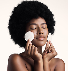 Image showing Black woman, cotton pad and beauty, eyes closed with skincare and natural cosmetics on white background. Clean makeup from face, wellness and skin, African female model with glow and dermatology