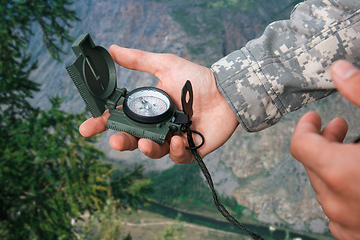 Image showing Man with compass in Altai mountains