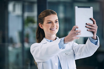Image showing Doctor, happy woman or selfie at hospital for social media app, profile picture or about us post online. Tablet, smile or medical worker taking photo for blog, internet or web networking in clinic