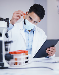 Image showing Science, blood test and man with tablet for research analysis, vaccine or healthcare, face mask and laboratory. Medical data, scientist doctor or person on digital technology for covid or dna results