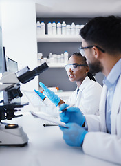 Image showing Scientist man, woman and tablet for microscope analysis, dna or virus for pharmaceutical company in lab. Teamwork, medical research and digital touchscreen for data, info or pharma study for wellness