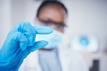 Image showing Laboratory, woman or hand of scientist with little sign for research, assessment or experiment innovation. Healthcare, blur or biologist with small scale gesture for future development or results