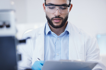 Image showing Results, man or scientist writing research notes for analysis on experiment, information or innovation. Biologist, biotechnology or researcher in a laboratory with documents for science development