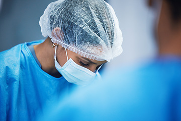 Image showing Hospital, surgery and team of doctors in theatre for medical support, teamwork or healthcare solution in face mask. Focus of nurses and surgeon in blue scrubs in operating room, emergency and helping