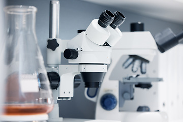 Image showing Science, laboratory and microscope with pharmaceutical test for healthcare study and medicine. Medical tools, research and innovation in health care, biotechnology and zoom on chemical investigation.