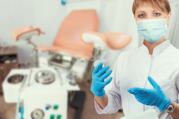 Image showing Female gynecologist in protective mask