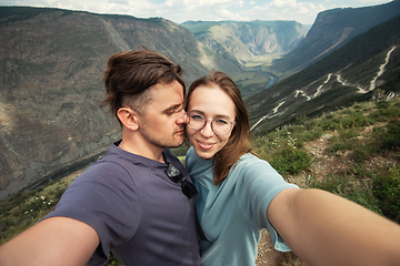 Image showing Loving couple together on mountain