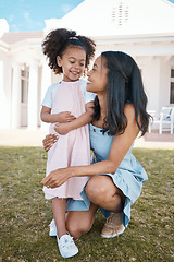 Image showing Mother, smile and hug girl outdoor at home backyard, bonding and having fun. Happy, daughter and mom embrace with child for love, care for kid and enjoying quality time together on holiday vacation.