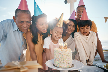 Image showing Birthday cake, children and senior family in summer for group celebration, party and grandparents love and care. Happy latino people with kids or girl celebrate on outdoor patio, holiday and candles