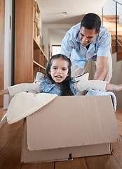 Image showing Dad, child and box, playing on floor in home with love and fantasy for happy family with smile and fun. Cardboard ride, playful bonding and father with girl in new house, games and adventure for kids