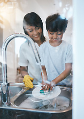 Image showing Woman, boy child and dishes at kitchen sink for learning, cleaning and hygiene with care in family house. Mother, boy and washing play with soap, water and teaching for skills, chore or stop bacteria