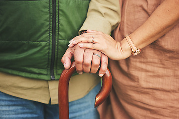 Image showing Closeup, hands and couple with support, cane and retirement with solidarity, marriage or appreciation. Zoom, touching or senior man with old woman, love or care with empathy, understanding or comfort