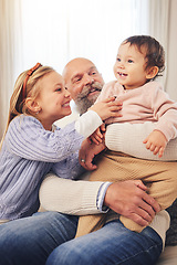 Image showing Grandfather, children and play with happiness, home and cheerful with fun, bonding and loving together. Senior man, siblings or kids in a living room, chilling and love on a weekend break and excited