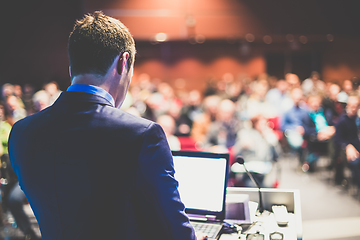 Image showing Public speaker giving talk at business event.