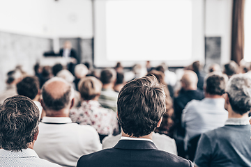 Image showing Business speaker giving a talk at business conference event.