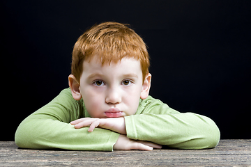 Image showing boy looks into the distance