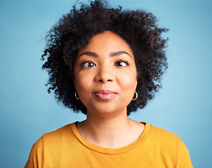 Image showing Funny, comic and a portrait of a woman on a blue background for emoji facial and crazy expression. Happy, comedy and face of a girl expressing goofy personality isolated on a studio backdrop