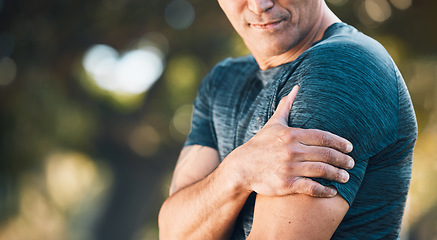 Image showing Arm pain, outdoor and man in a park with sport injury and muscle strain from fitness and workout. Exercise problem, male person and back with medical, health and problem from training accident