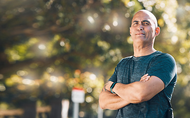 Image showing Man, outdoor and arms crossed portrait in a park for fitness, workout and athlete training. Male person, mature and wellness in nature with mockup and confidence in a forest for sport and health