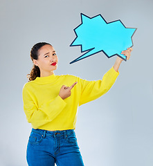 Image showing Speech bubble, confused and woman pointing to chat, social media opinion and confused for translation in portrait. Gen z person with doubt, question and language mockup or quote on studio background