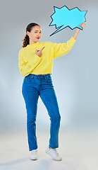 Image showing Speech bubble, portrait and woman pointing to chat, social media opinion and confused, translation or communication. Gen z person in doubt, question and language mockup or quote on studio background