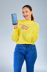Image showing Phone screen, mockup and portrait of woman or student in university presentation, website or registration information. Happy person, mobile space of college, contact or ux design on studio background