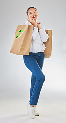 Image showing Recycle logo, environment and woman with bag, sustainability with shopping isolated on white background. Environmental, retail and eco friendly, female person and sustainable development in studio