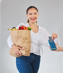 Image showing Card machine, groceries and woman in portrait for POS, shop payment and fintech or digital finance. Grocery shopping, credit and cashier hands, people and food bag, point of sale on studio background