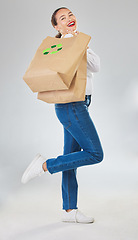 Image showing Recycling, environment and woman with bag, sustainability with shopping isolated on white background. Environmental, retail and eco friendly, female person and sustainable development in studio