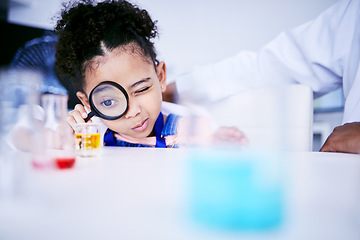 Image showing Child, science and chemistry with a magnifying glass in laboratory for a test or research. African kid student curious for scientist, education or learning chemical experiment in class with magnifier