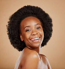 Image showing Happy, skincare and portrait of a black woman with a glow from dermatology, salon or wellness. Smile, beauty and face of an African model with care for skin isolated on a brown background in a studio