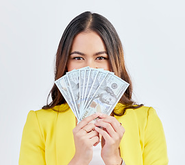 Image showing Money portrait, hide or business woman with cash dollar bills, competition reward or bonus salary prize. Studio winner, economy or female trader face with income, profit or wealth on white background