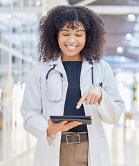 Image showing Happy, doctor and woman with tablet for research in hospital, telehealth and healthcare. Technology, medical professional and African person on app for wellness, internet and typing email in clinic.