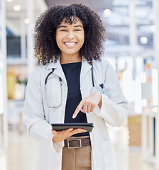 Image showing Portrait, doctor and happy woman with tablet for research, telehealth and healthcare in hospital. Digital technology, medical professional and person from South Africa on app, internet and wellness.