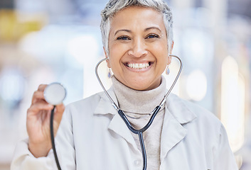 Image showing Portrait, medical and stethoscope with an old woman doctor in the hospital for cardiology or treatment. Healthcare, heart health and wellness with a senior female medicine professional in a clinic