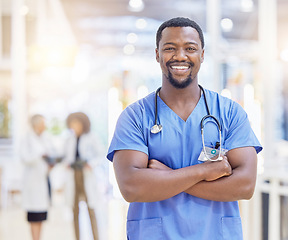 Image showing Portrait, nurse and black man with arms crossed, smile and healthcare in hospital. Medical professional, face and confident surgeon, African doctor or worker with pride for career, job and wellness