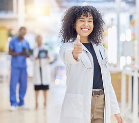 Image showing Thumbs up, portrait and doctor or woman in healthcare support, thank you or excellence for hospital services. Medical professional or african person like, yes and ok hand or emoji for clinic success