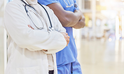 Image showing Hands, doctors and team with arms crossed in hospital, clinic and medical support. Closeup of people, expert collaboration or healthcare staff ready for service with pride, help and trust in medicine