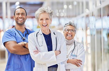 Image showing Portrait, doctors and team arm crossed for healthcare service, leadership and success in hospital or clinic. Happy, laugh and face of professional medical woman, mentor and internship nurse in group