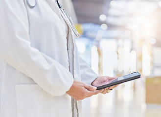 Image showing Doctor, hands and person with tablet for medical information, data research or healthcare in hospital. Closeup of physician, digital technology and planning telehealth, internet app or online results