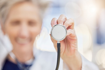 Image showing Hand, stethoscope and doctor listening to heart for healthcare in wellness hospital. Medical professional, expert and cardiology equipment, tools or exam to monitor pulse for health checkup in clinic