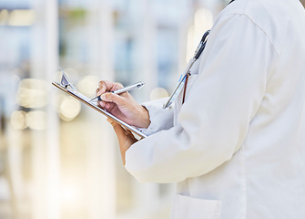 Image showing Hands, person or doctor writing on clipboard, documents or administration of healthcare schedule. Closeup of medical worker, pen or report of insurance checklist, contract or paper script in hospital