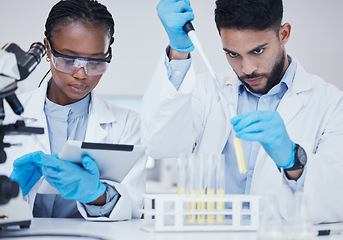 Image showing Man, black woman or scientists with test tubes in research for medical, experiment assessment or innovation. Tablet, studying biotechnology or researchers team in laboratory for science development